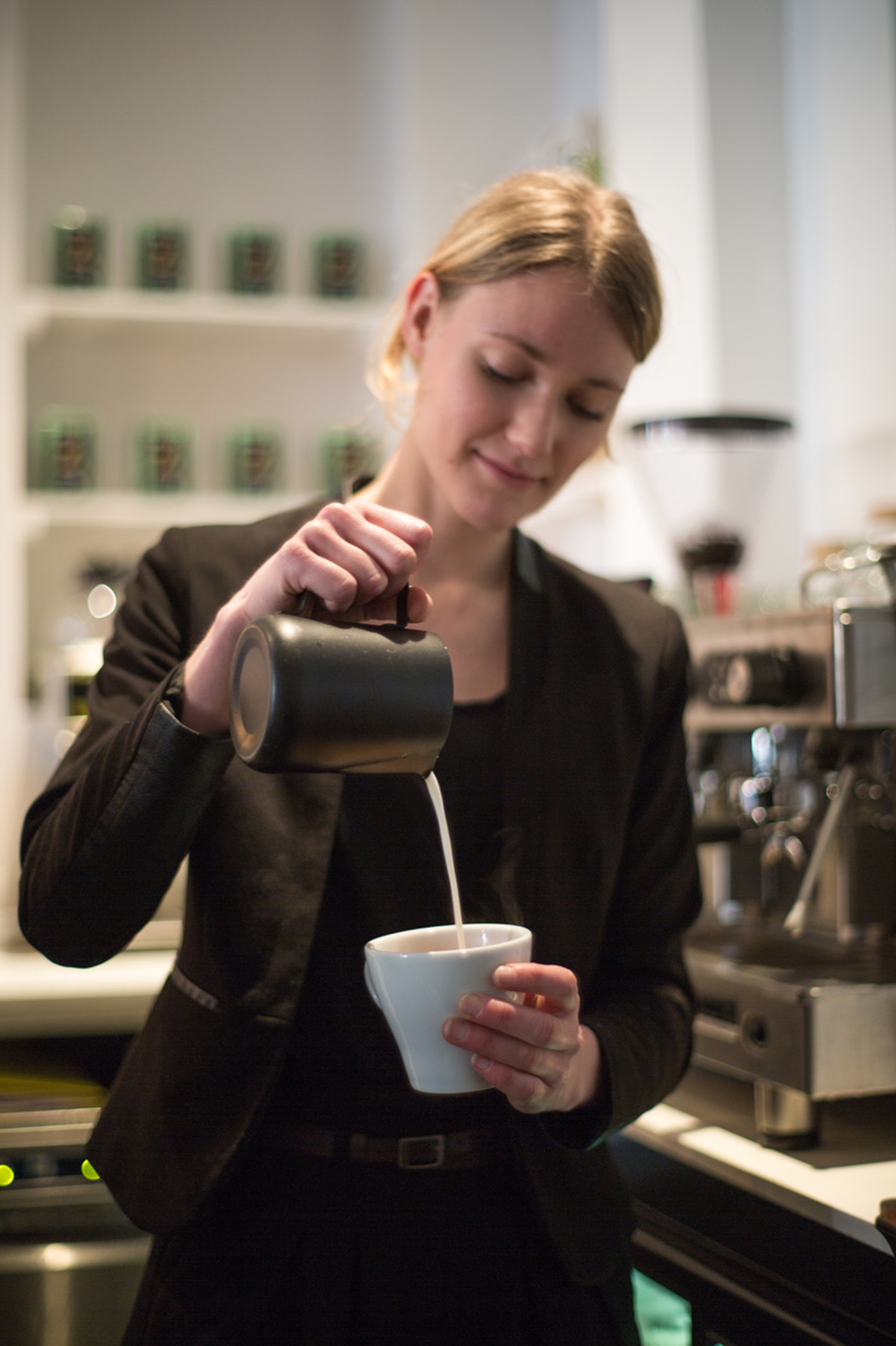 Sandra-serving-coffee - Positively Putney